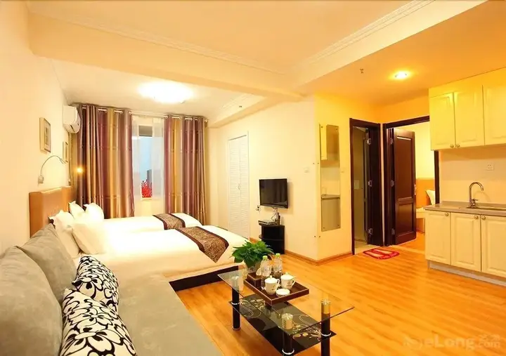 Циндао: Qingdao Xinlong Holiday Apartment