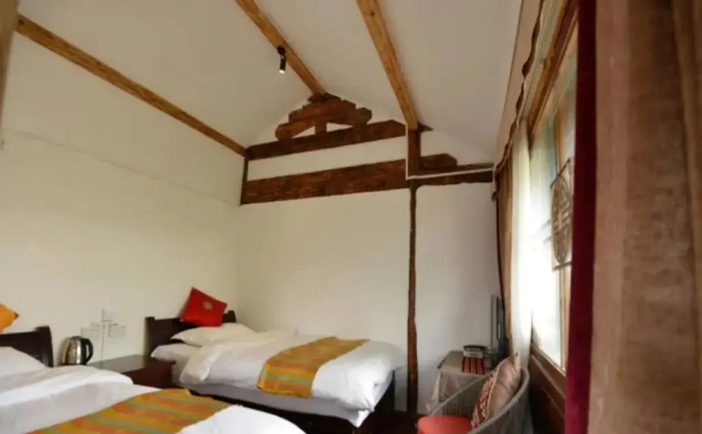 Лицзян: Qingyun Yard Stories From Afar Inn Lijiang