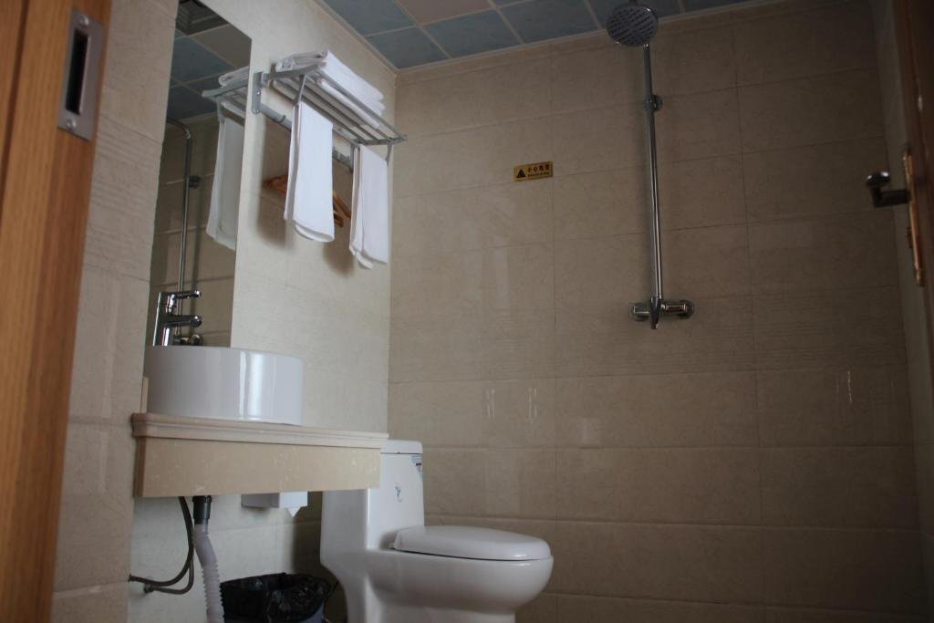 Циндао: Qingdao Haoke 100 Business Hotel
