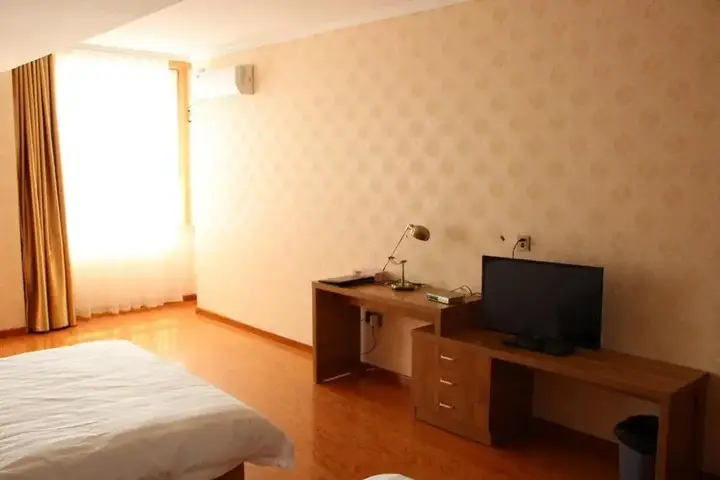 Циндао: Qingdao Haoke 100 Business Hotel