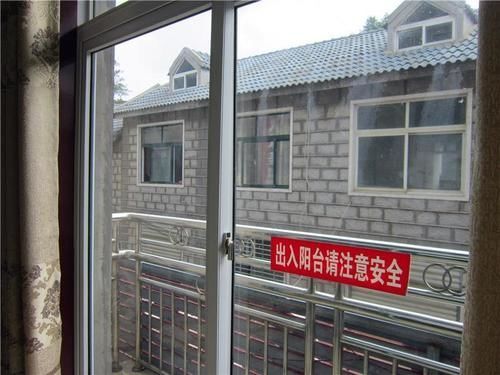 Синьян: Xinyang Jigong Mountain Wenchenju Inn