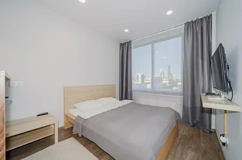 Апартаменты Rooms in Radius Central House с видом на город(11 этаж) — фото 1