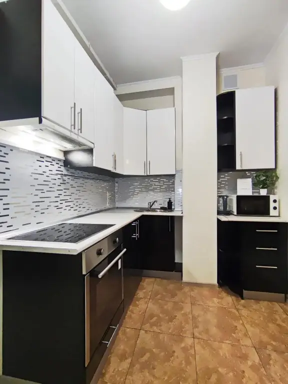 Сургут: Апартаменты ЗИМА на улице Иосифа Каролинского 16