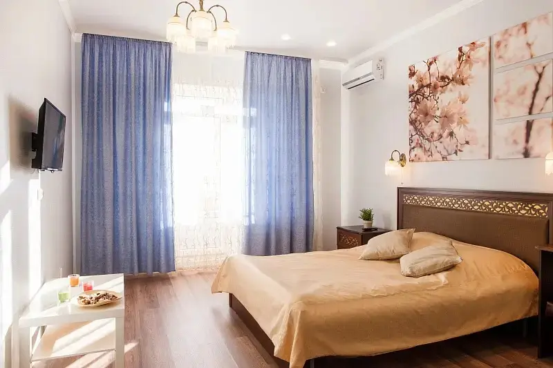 Апартаменты Стандартные двухместные с отдельной спальней и кухней — фото 1