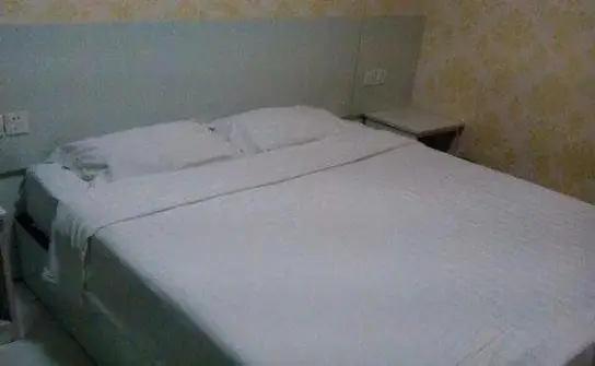 Хецзе: Xinhe Business Hotel