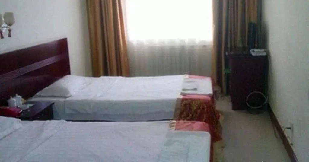 Линьи: Yidali Business Hotel