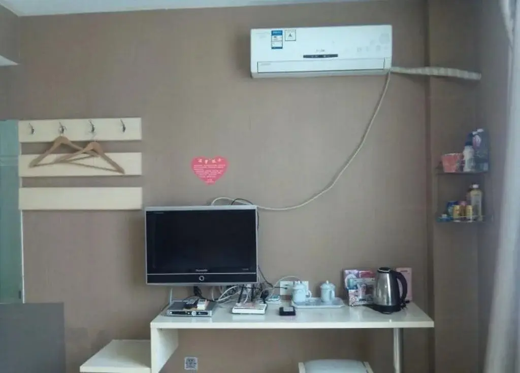 Хецзе: Heze E Home Business Hotel