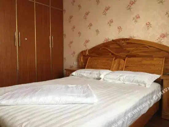 Чунцин: Chongqing Wuduqin Family Apartment