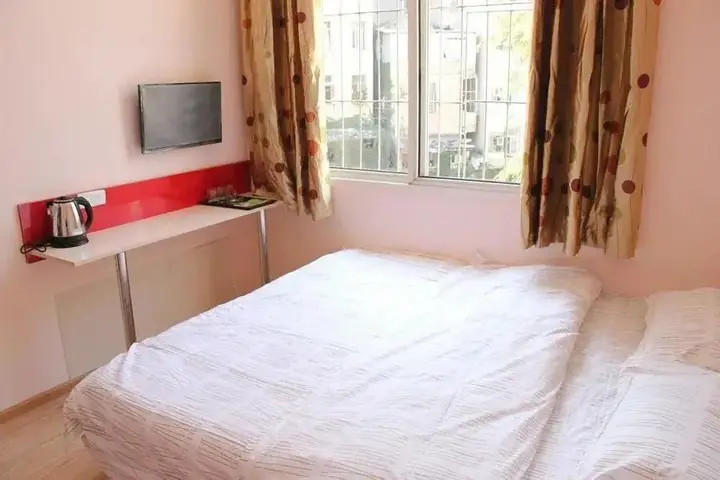 Ухань: Wuhan Bingo Apartment