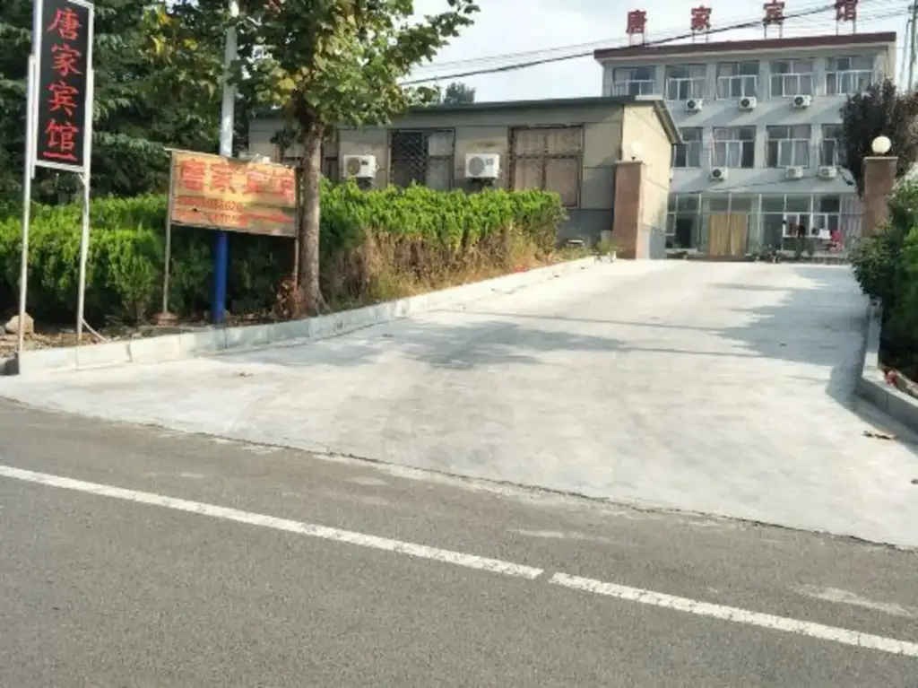 Линьи: Tangjia Hotel