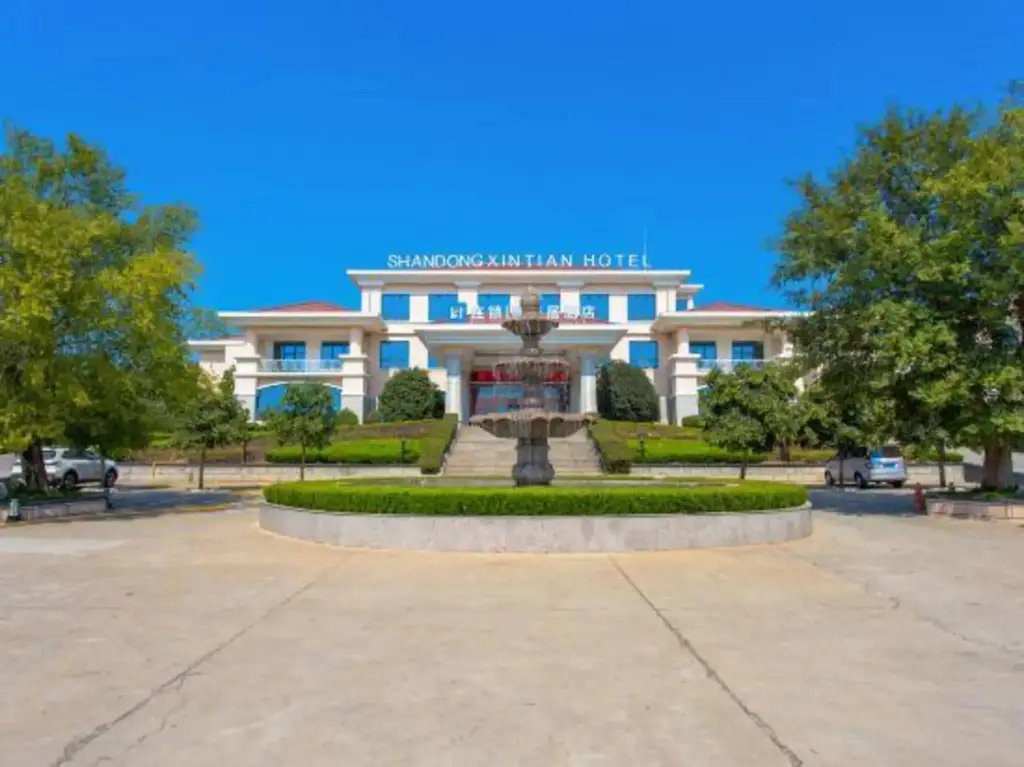 Линьи: Xintian Hotel