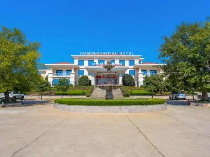 Линьи: Xintian Hotel
