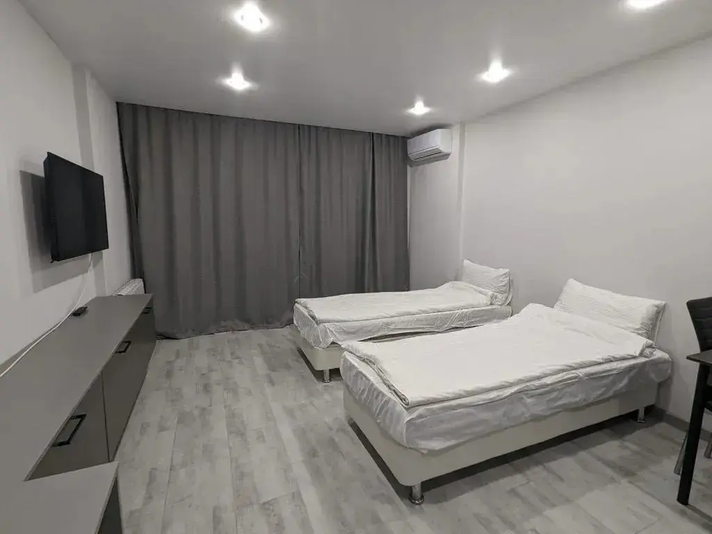 Апартаменты RentHome студия Грей на Южном шоссе у ТЦ Амбар — фото 1